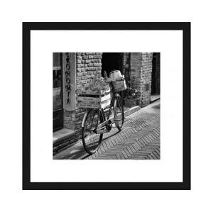 Rámovaný obraz Kolo na ulici 30x30 cm, černobílý